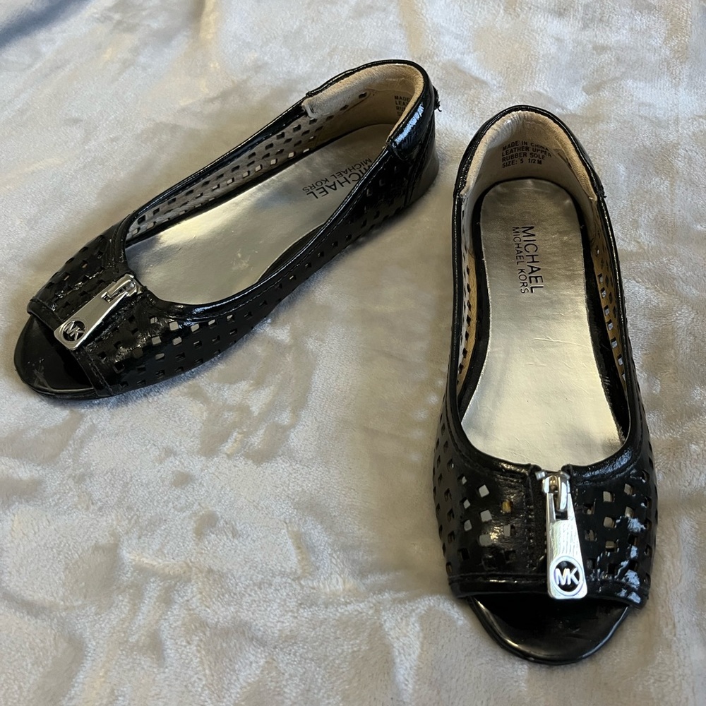 Michael Kors perforated black patent leather flats